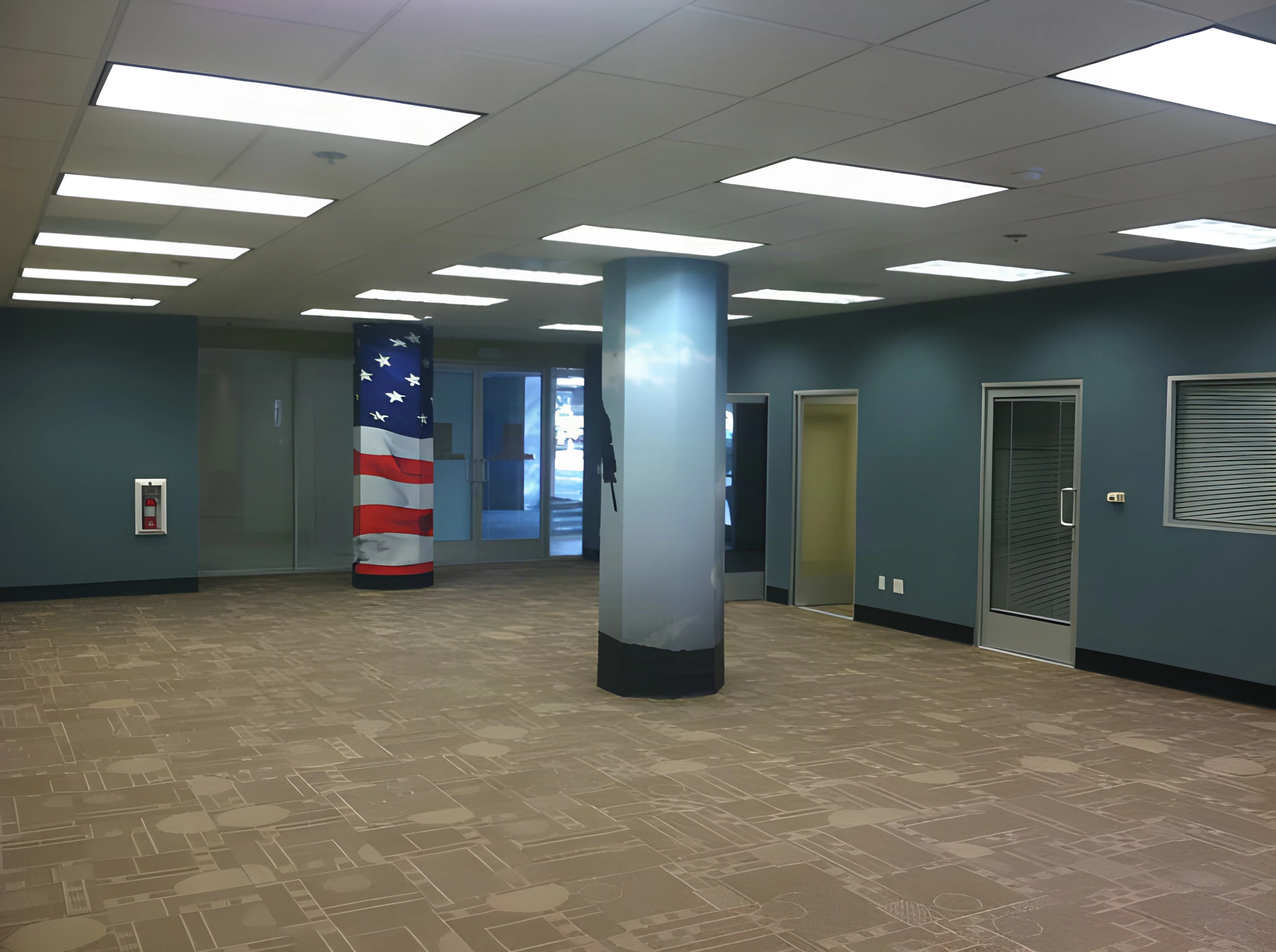 Teal-walled office floor with glass doors and patterned carpet at the Los Angeles career center