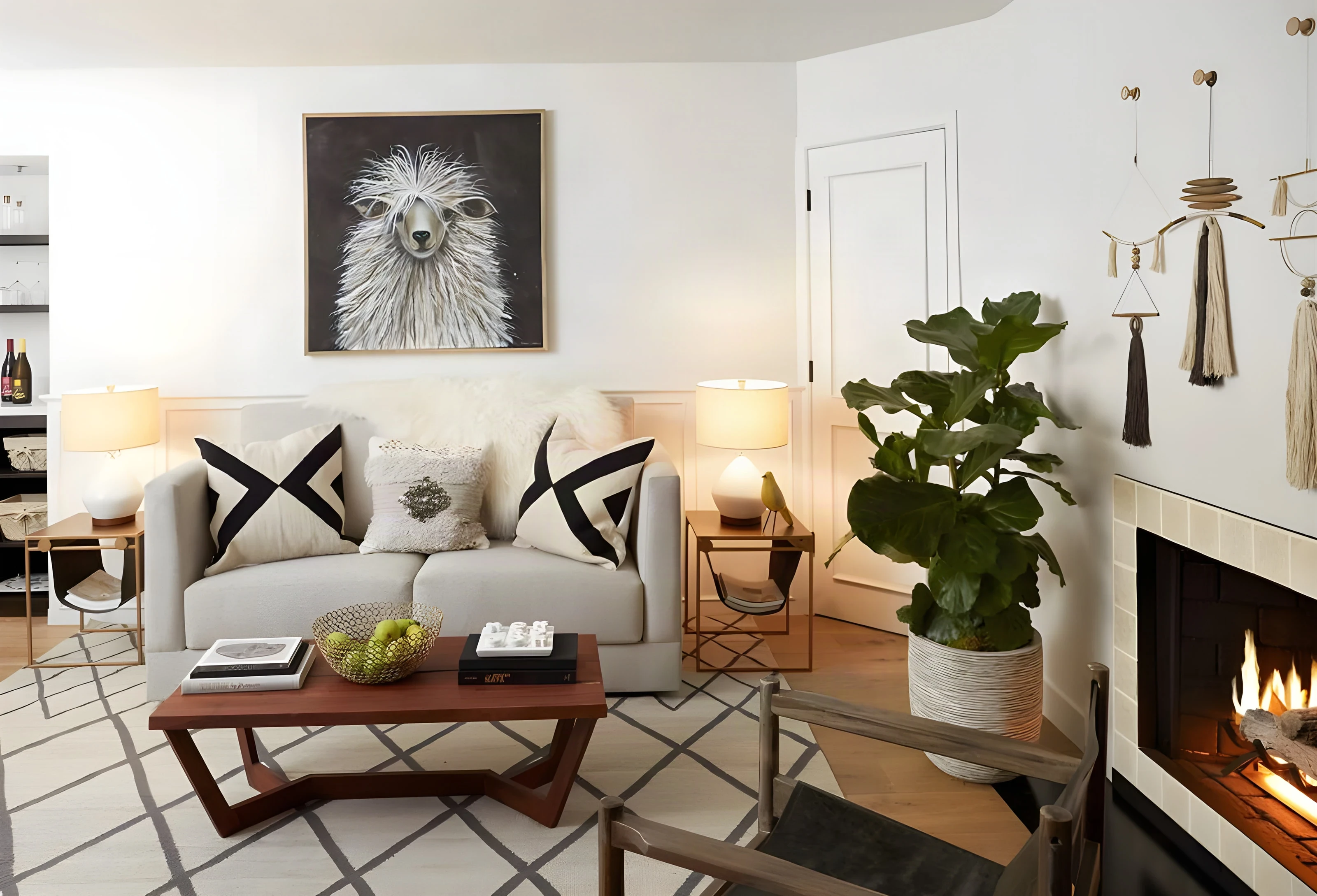 Suite at The Landsby with a fireplace, llama portrait and patterned rug