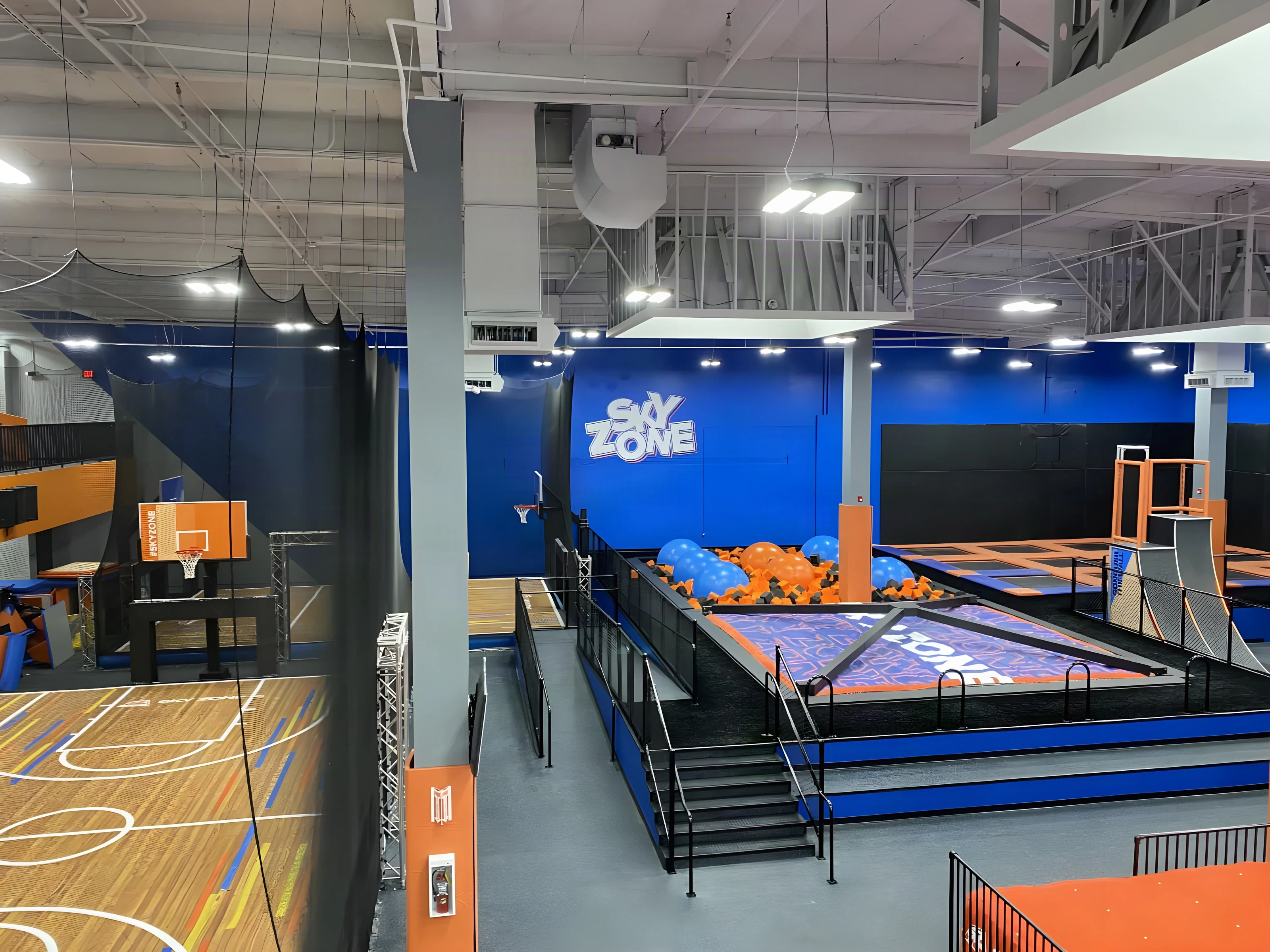 Basketball dunk court and foam pit viewed from above at Sky Zone Rancho Cucamonga